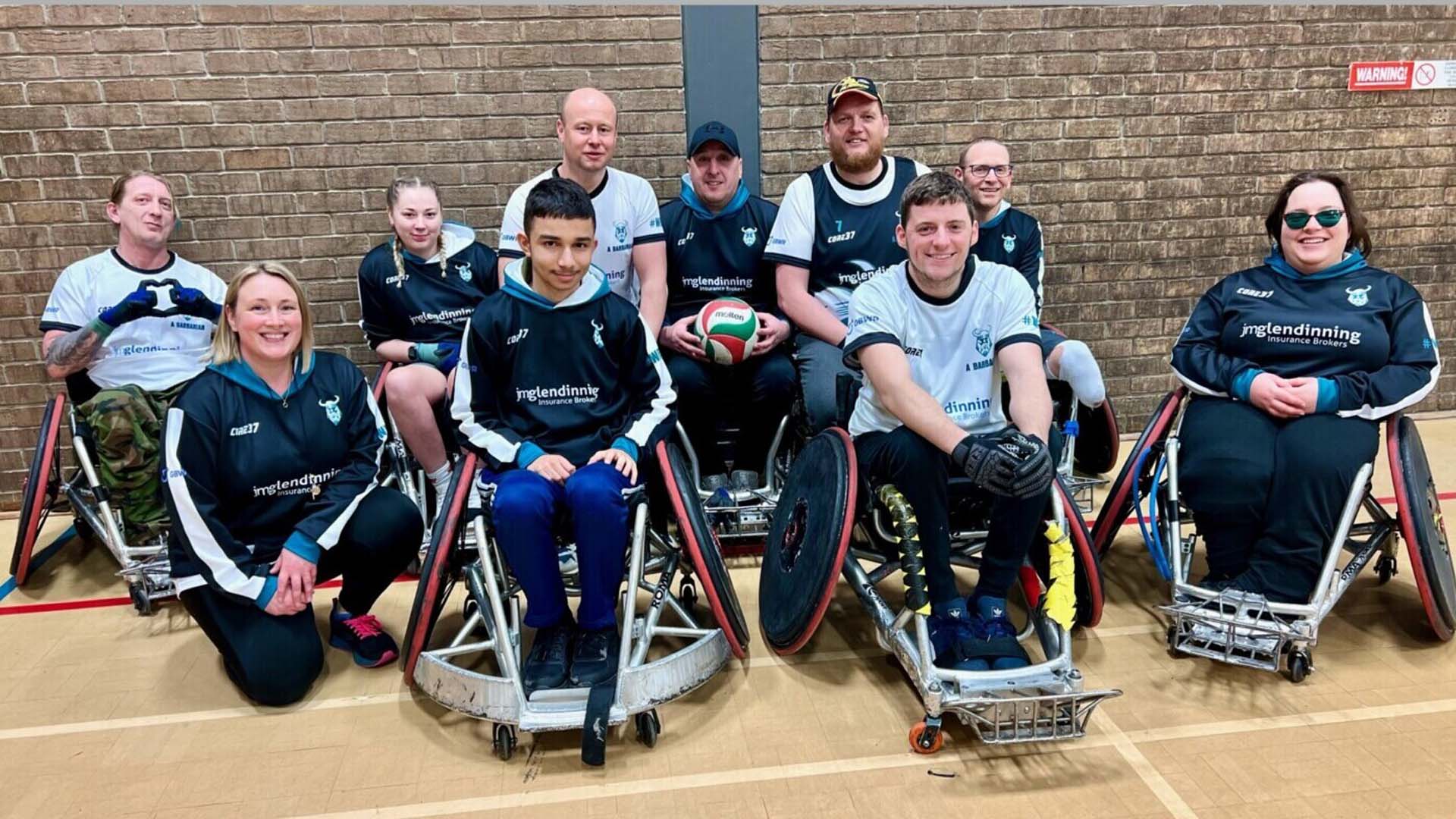 Group image of the North East Barbarians Wheelchair Rugby team, wearing sponsored kit